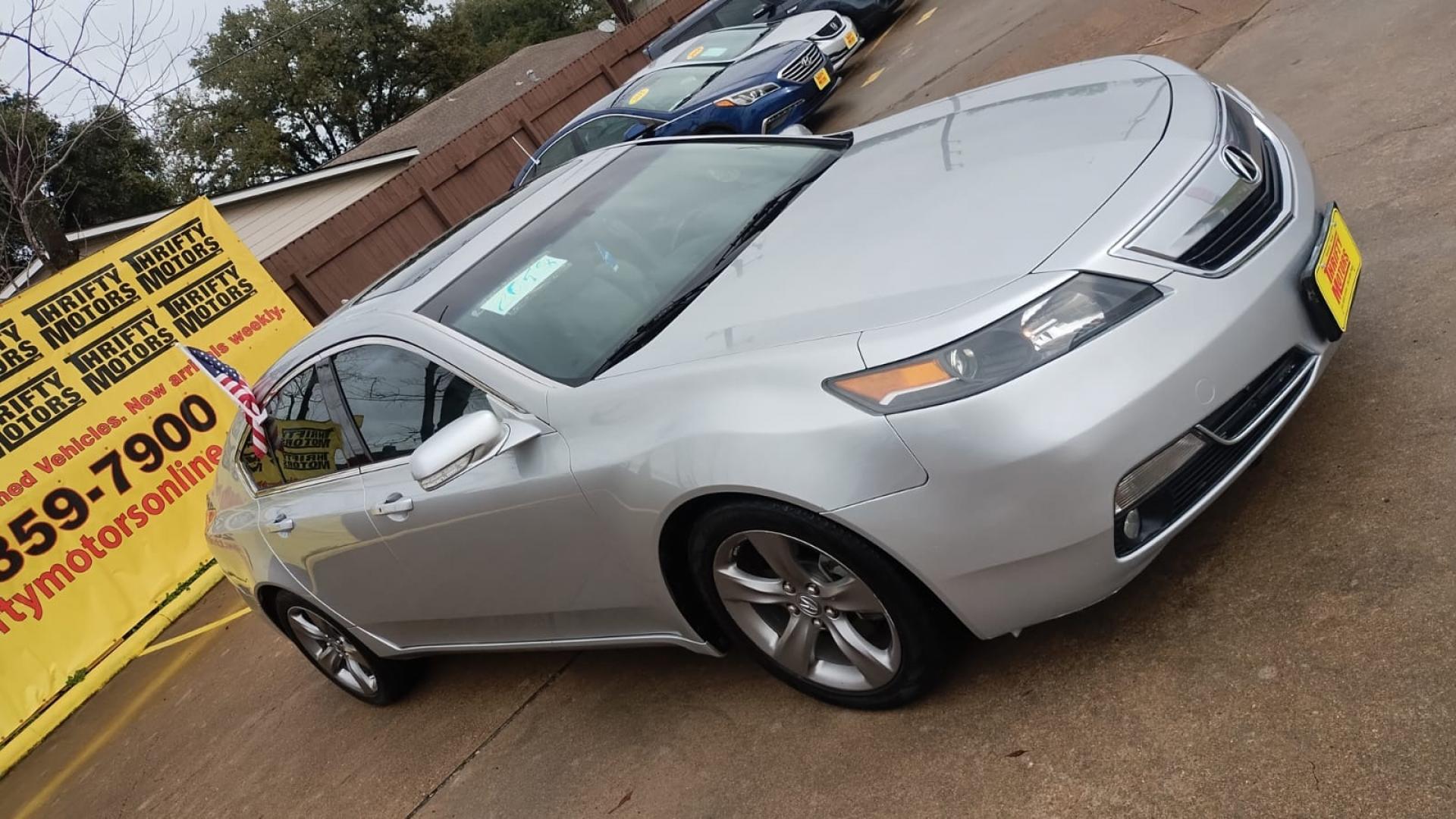 2013 Acura TL (19UUA8F78DA) , located at 16710 Clay Rd., Houston, TX, 77084, (281) 859-7900, 29.834864, -95.656166 - Photo#1